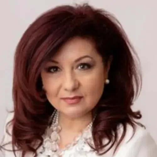 Voula Spingos, Agent