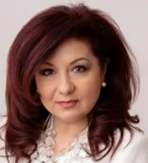 Voula Spingos, Agent